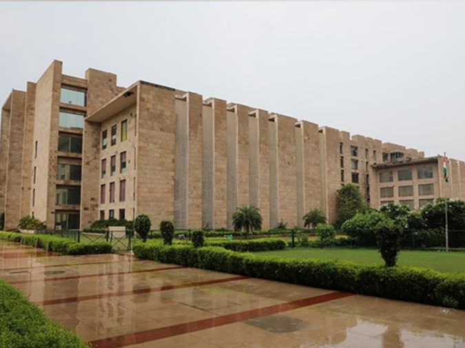 Students attending a lecture in a Tier-3 engineering college classroom in India.