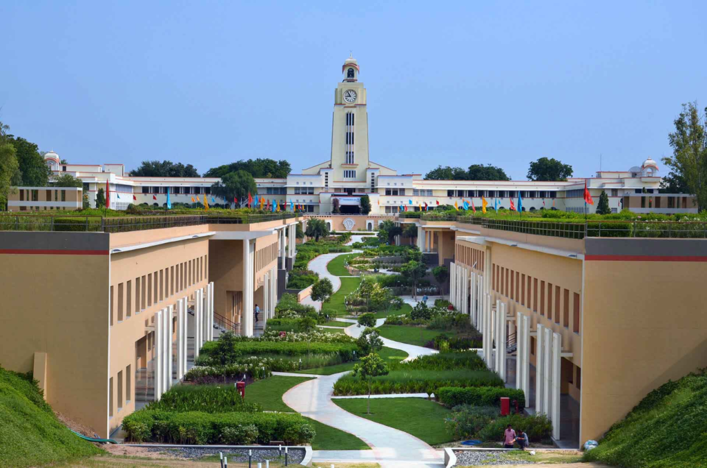 Birla Institute of Technology and Science Pilani campus with academic buildings and students.