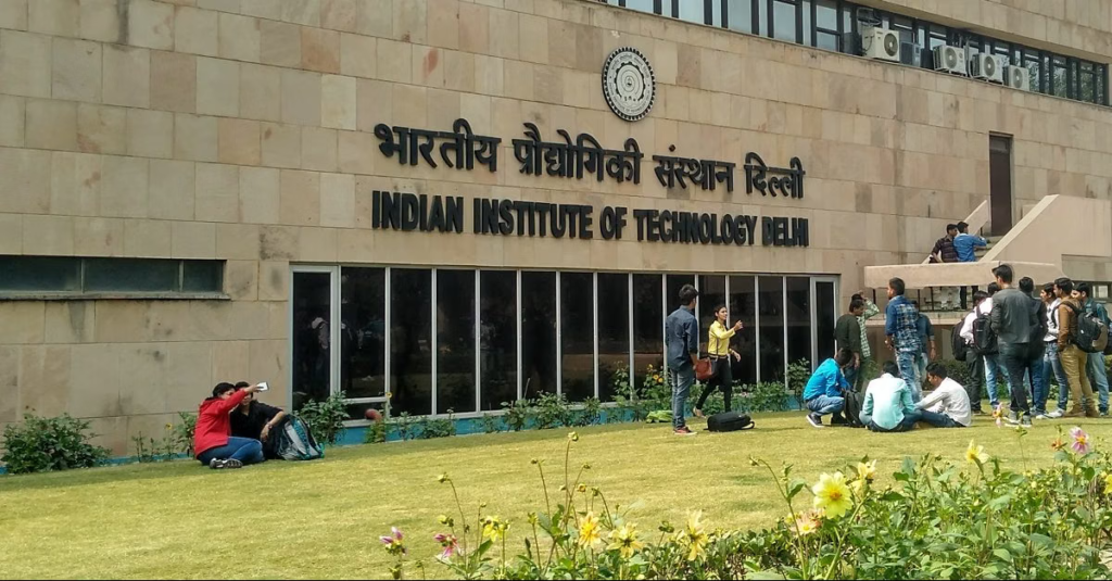 Indian Institute of Technology Delhi campus with academic buildings and students. 