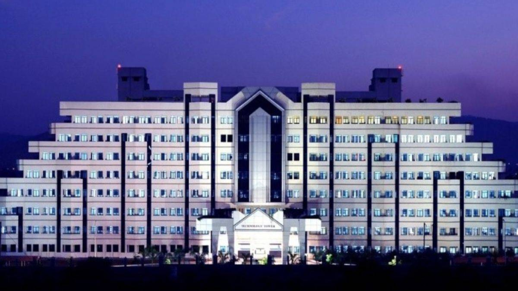 Vellore Institute of Technology campus with modern buildings and students.